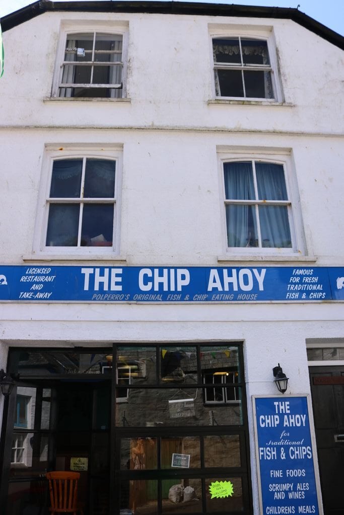 A white and blue fish & chip shop.